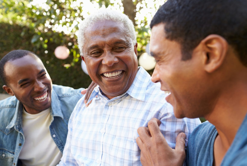 Senior Man Talking with His Adult Sons in Garden Flurl how to help your parents age gracefully